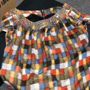 Checkered blouse with embellishments